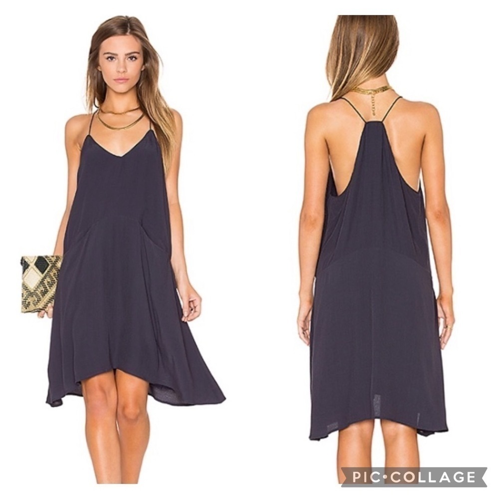 Knot Sisters navy blue crepe dress with drop waist, front pockets uneven hem EUC